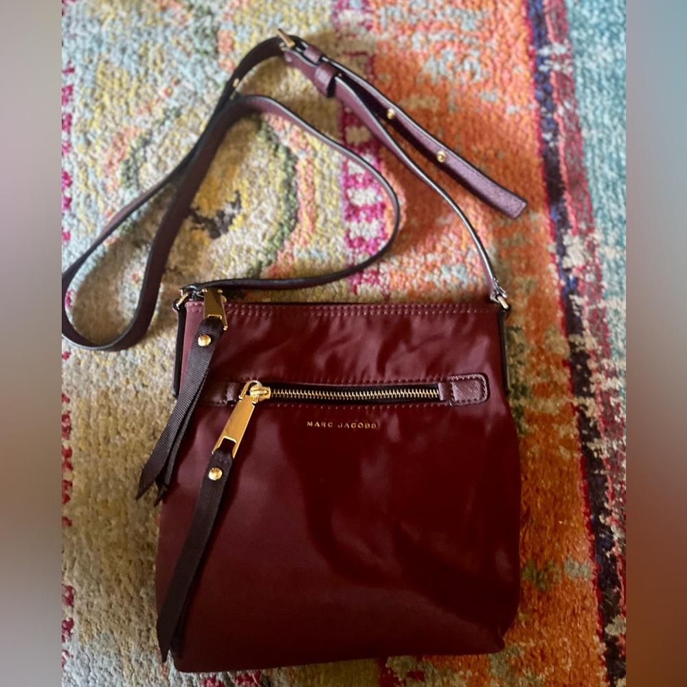 Marc Jacobs Burgundy Crossbody Bag with Gold Hardware and Adjustable Strap